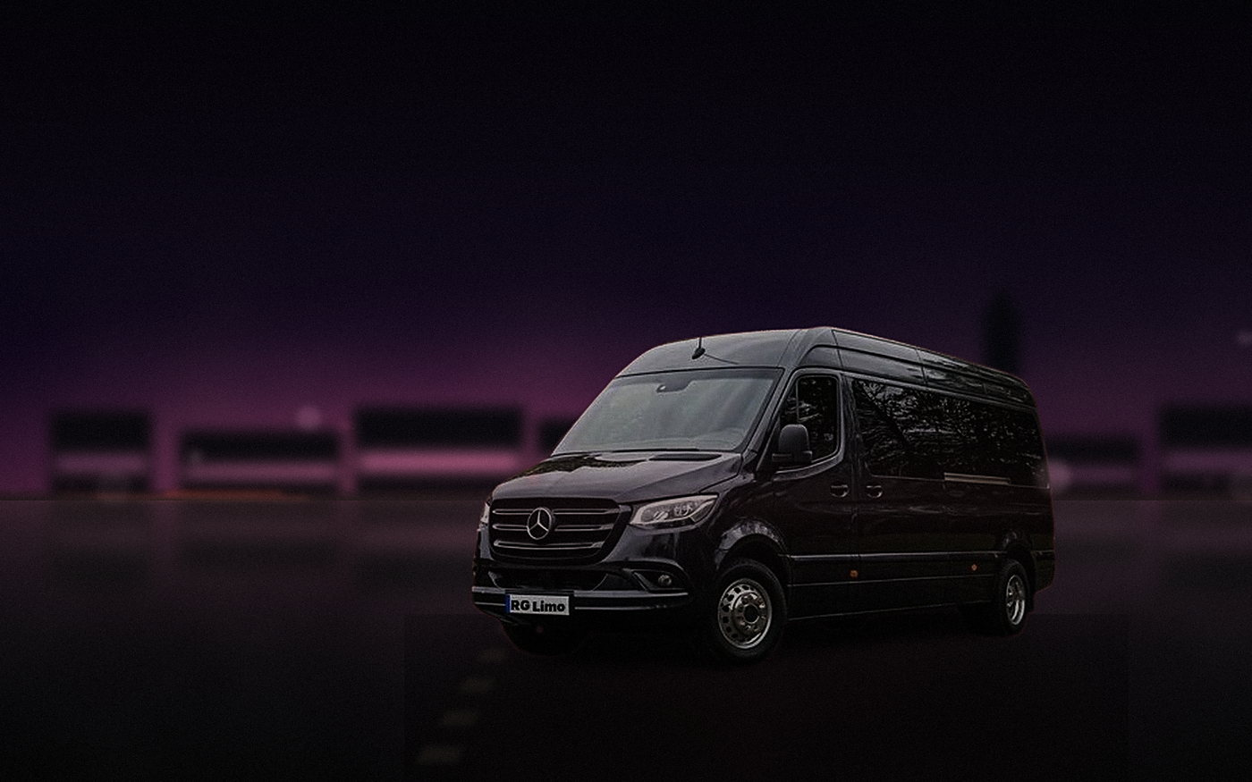 Black Mercedes-Benz Sprinter van on a lit Los Angeles street on a late group transfer
