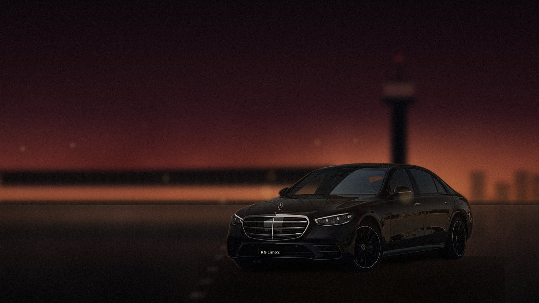 Black Mercedes-Benz S-Class sedan collecting a passenger at LAX arrivals as the sun goes down