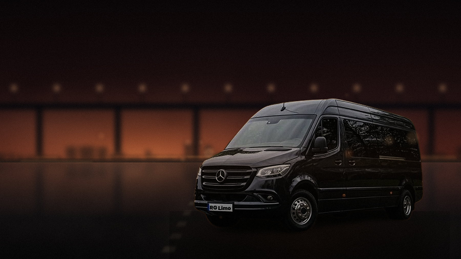 Black Mercedes-Benz Sprinter van on the freeway to Anaheim at sunset with a family on board