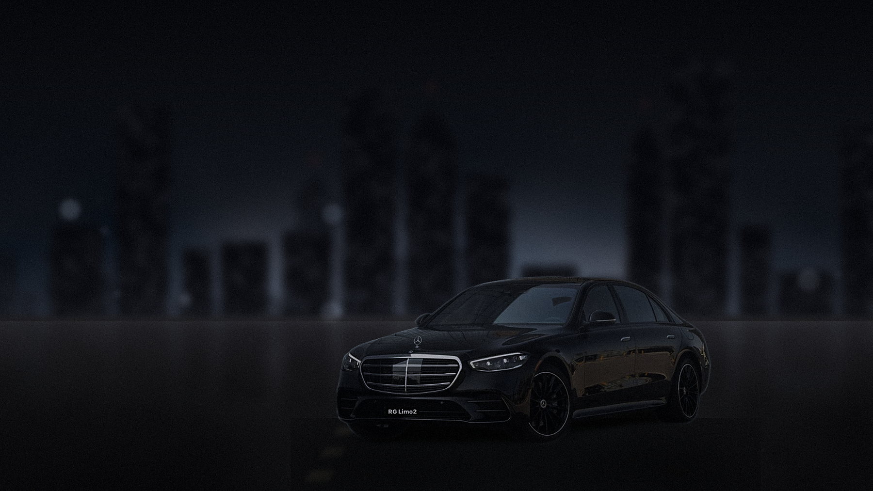 Black Mercedes-Benz S-Class sedan below a Los Angeles office tower in cold early-morning light