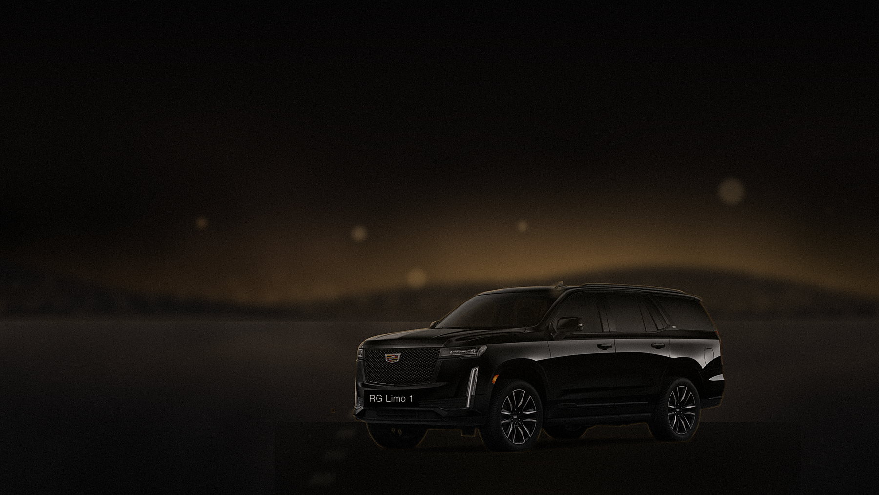 Black Cadillac Escalade on a hillside road above Los Angeles in late golden light