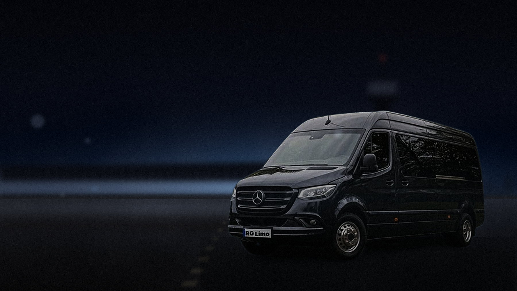 Black Mercedes-Benz Sprinter van at an airport kerb in Los Angeles loading a full group and luggage